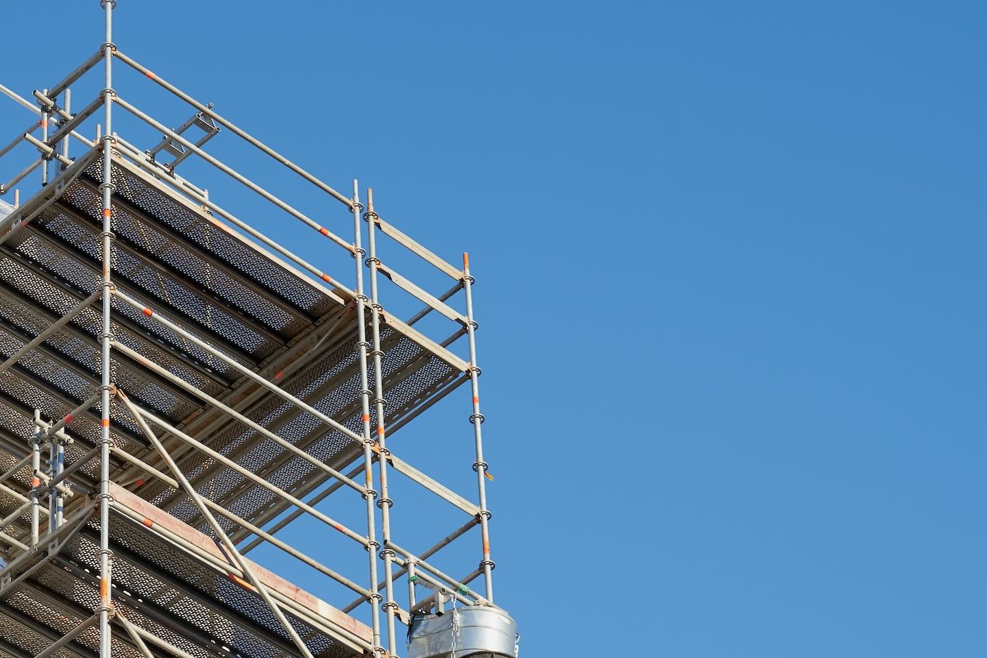 Scaffold with sky in the background